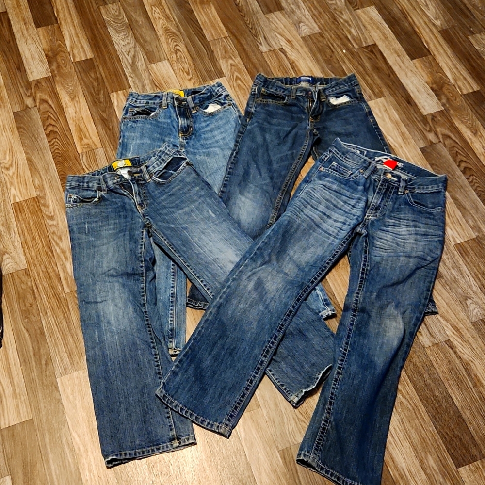 Four pairs of boys jeans